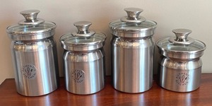 lot 64 image: Set of 4 Authentic Kitchen Stainless Steel Canisters