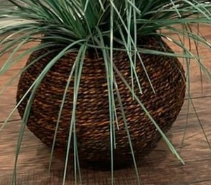 lot 93 image: Faux Plant in Woven Basket