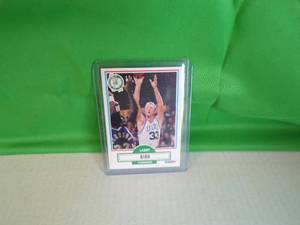 lot 112 image: 1990 Fleer Basketball Jumbo Pack (Unopened)  Larry bird Card (Magic Johnson on front of card)