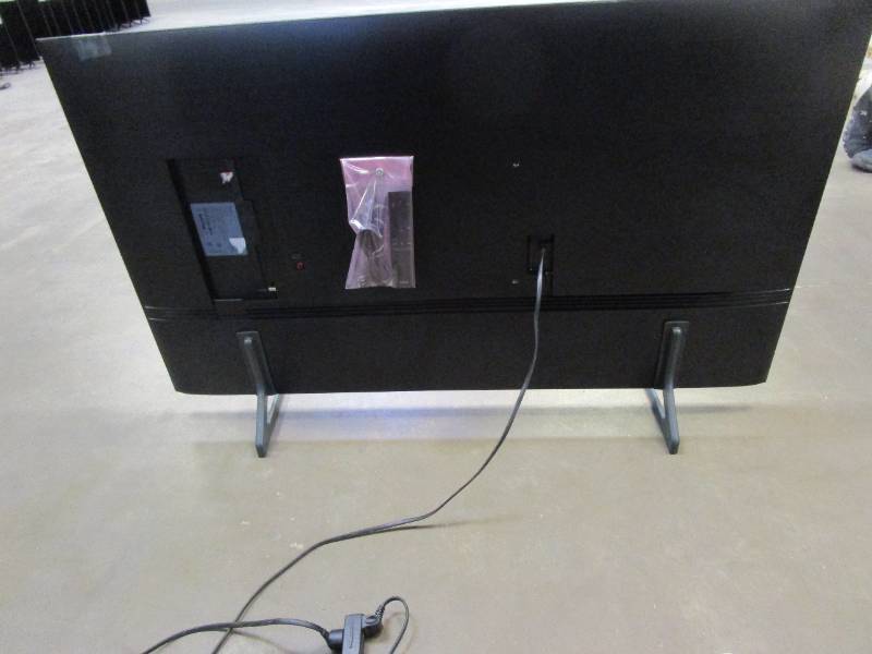 lot 975 image: Samsung - 50 Class Q60B QLED 4K Smart Tizen TV ModelQN50Q60BAFXZA (RESERVE $400)