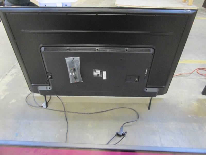 lot 902 image: LG 65 Class 4K UHD Smart LED TV - 65UQ7570PUJ (SCRATCH IN CENTER OF SCREEN)