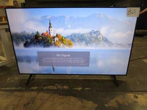lot 822 image: LG - 70 Class UQ75 Series LED 4K UHD Smart webOS TV (CUT IN CENTER OF SCREEN)