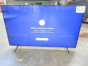 lot 828 image: Samsung - 65 Class 7 Series LED 4K UHD Smart Tizen TV ModelUN65TU7000FXZA (CUTS CENTER OF SCREEN)