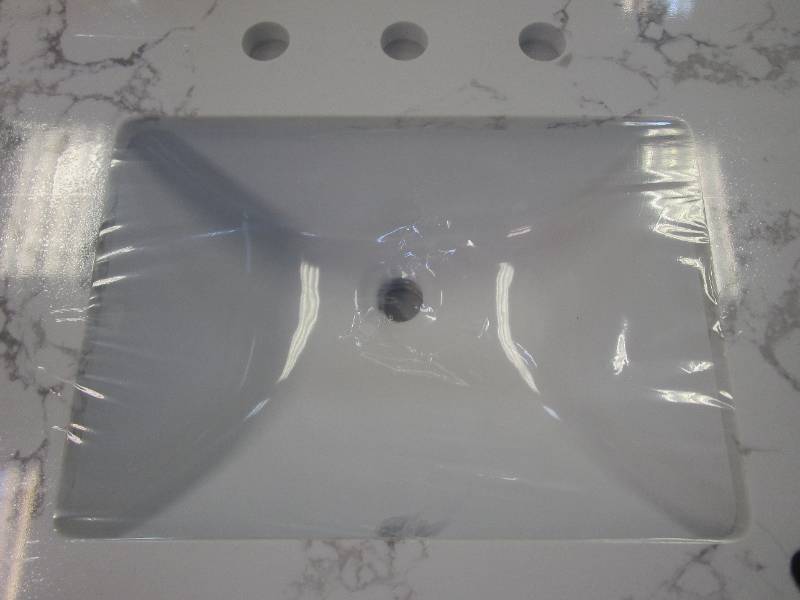 lot 373 image: 37 in x 22 in 3 Hole Engineered Stone Vanity Top (CHIP IN FRONT LEFT CORNER)