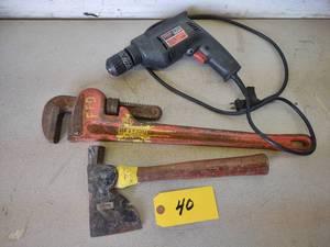 lot 40 image: Drill, 24 Pipe Wrench, & Hatchet...