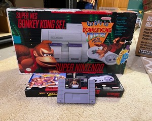 lot 267 image: Original Super Nintendo SNES System- Donkey Kong Bundle