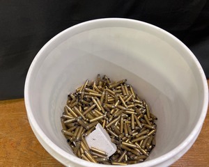 lot 50O image: Bucket of Spent Shells
