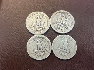 lot 15 image: LOT OF 4 SILVER QUARTERS FROM 1930S