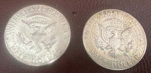 lot 21 image: 2 KENNEDY SILVER HALF DOLLARS