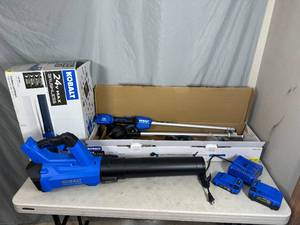 lot 52 image: New Kobalt 24 Volt Cordless String Trimmer, Blower, 2 Batteries