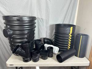 lot 65 image: New Sump Pump Liner with Assorted Plumbing