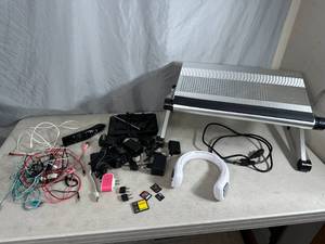 lot 123 image: Arctic Air Neck Fan, Cords, Memory Cards, Laptop Riser, Etc