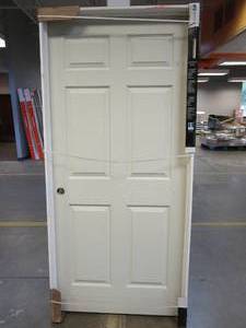 lot 168 image: JELD-WEN 36 in. x 80 in. 6 Panel Colonist Primed Right-Hand Textured Molded Composite Single Prehung Interior Door (SCRATCH & DENT, SLIGHT WATER DAMAGE)