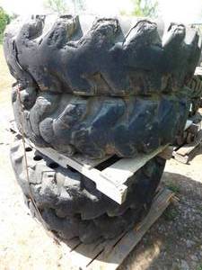 lot 23 image: 4 - Rough Terrain Solid Cushion Tires on Rims - 1300 - 24