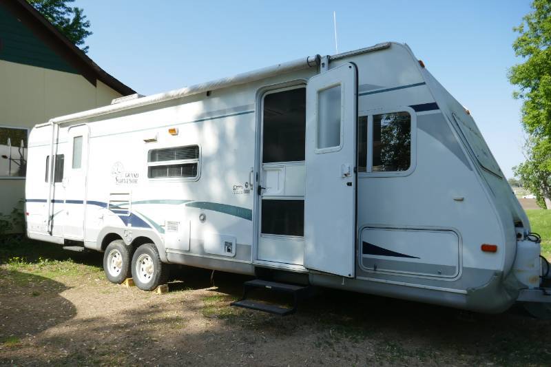 2003 Ford Taurus And 2005 Forest River Grand Surveyor Camper 