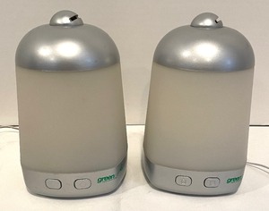 lot 133 image: Two Green Air Diffusers with a Variety of Doterra Essential Oils