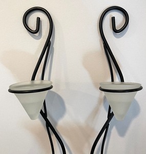 lot 147 image: Pair of Curvy Black Metal Wall Mount Candle Holders