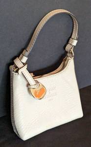 lot 239 image: Miniature Dooney and Bourke Leather Purse