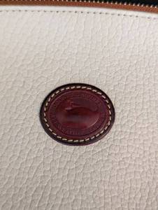 lot 240 image: Dooney and Bourke Cream Leather Coin Purse