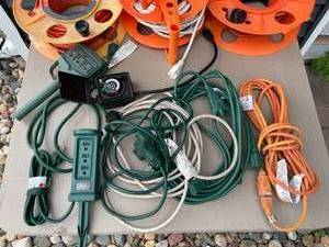lot 397 image: Extension Cords, Cord Reels, and Timer