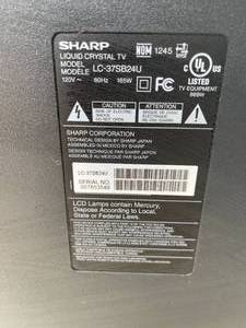 lot 402 image: Sharp Liquid Crystal TV With Remote Model LC-37SB24U