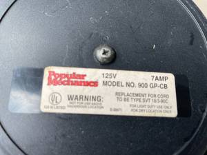 lot 404 image: Popular Mechanics Hanging Retractable Trouble Light Model 900.GP-CB