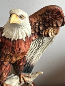 lot 46 image: Arami Giuseppe Bald Eagle on a Branch Figurine