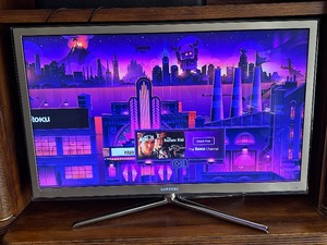 lot 65 image: Samsung 46 Inch 3-D Television with 3D Glasses and 3D DVD Player