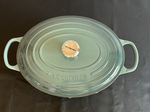 lot 14 image: Large Le Crueset 9.5 Inch Covered Enamel Cookware Oval Pot
