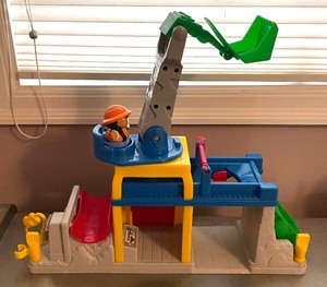 lot 506 image: Vintage Fisher Price Little People Police Station and Fun Sounds Crane & Quarry Construction Sets