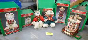 lot 16 image: 4 Christmas bunnies, a nativity globe and a musical santa