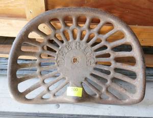 lot 100 image: Nice Vintage or Antique Deering tractor seat