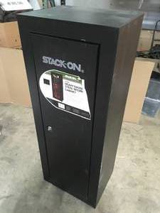 lot 18 image: STACK-ON 14-Gun 10 cu. ft. Key Lock Security Cabinet Damaged Door Does Not Open  Customer Returns See Pictures