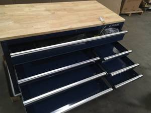 lot 24 image: Husky 52 in. W x 25 in. D Standard Duty 9-Drawer Mobile Workbench Cabinet with Solid Wood Top in Gloss Blue Customer Returns See Pictures