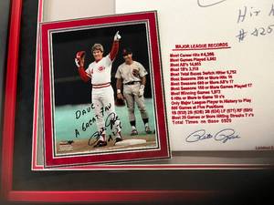 lot 1 image: authentic autographed Pete Rose Hit King #4256 jersey w 2 framed photos & Cincinnati Reds logos in display frame  w cert. of authenticity