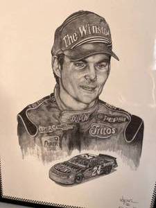 lot 13 image: NASCARS Jeff Gordon pencil sketch print by Adkins in glass frame