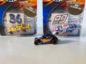 lot 20 image: new in box NASCAR Hot Wheels #22, #99, #36  NASCAR Collector Series brass medallion