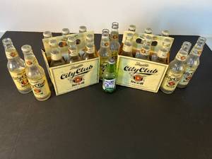 lot 28 image: 2 collectible 6-packs Schmidts City Club Beer, St. Paul bottles in carrying cases  6 extra bottles & a mini Rolling Rock beer bottle
