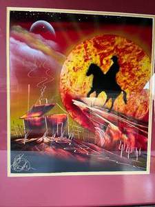 lot 36 image: Western-themed art print under UV glass in frame