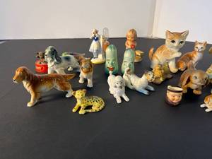 lot 115 image: lot of 29 assorted figurines, mainly porcelain, incldg. saltpepper dill pickle set, dutch girl minute timer & more