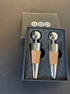 lot 131 image: fancy chrome bottle stopper set, pair of harmony balls, bicentennial tape dispenser in box