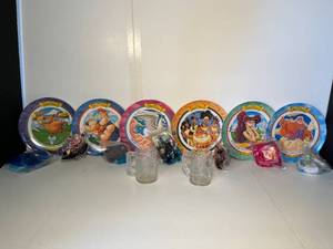 lot 153 image: 6 brand new 1997 McDonalds HerculesDisney plates, 2 glass McDonalds mugs  11 Happy Meal toys-unopened