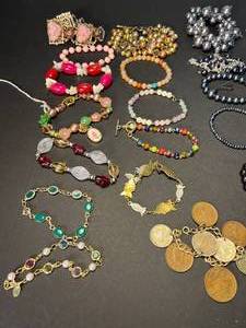 lot 231 image: its raining bracelets  lots of bracelets  beaded, coins, stones, fish, fashion pearls, brass 