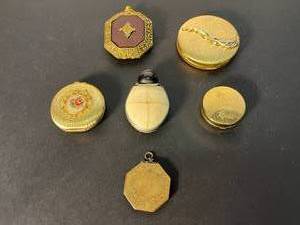 lot 233 image: 4 vintage beauty compacts Max Factor, Revlon, DuBarry  antique octagonal locket & shell or bone amulet