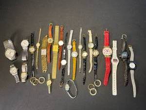 lot 236 image: lot of 23 watches incldg. Timex, Armitronm Wyler, Saks 5th Ave., Becora, Oscar de la Renta, & Rolex