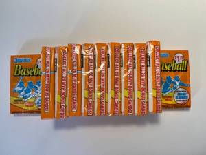 lot 211 image: lot of 11 unopened packs of Don Russ baseball trading cards