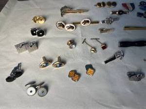 lot 222 image: vintage tie clips, cuff links, key chains, American Legion buttons, military campaign ribbon, 