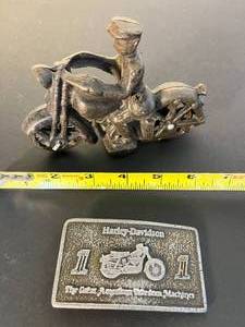 lot 184 image: 1974 Harley Davidson brass belt buckle  cool antique cast iron motorcycle rider