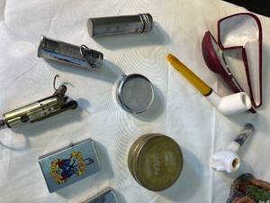 lot 189 image: ADULTS ONLY Got Smoke  anything & everything needed  pipes, lighters, Smokey the Bear cigarette distinguisher, Cheech & Chong cig. case  matches, vintage Holiday Survival Kit & more