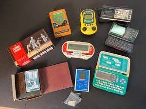lot 171 image: electronic handheld games - Nintendo Boxing, Mini Sport Game Soccer, Electronic Baseball & Battleship, Casio calculators, zombie and travel cribbage boards - 9 pieces